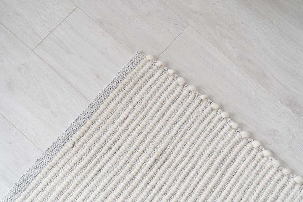 Amara Ivory and Cream Hand Woven Wool Rug