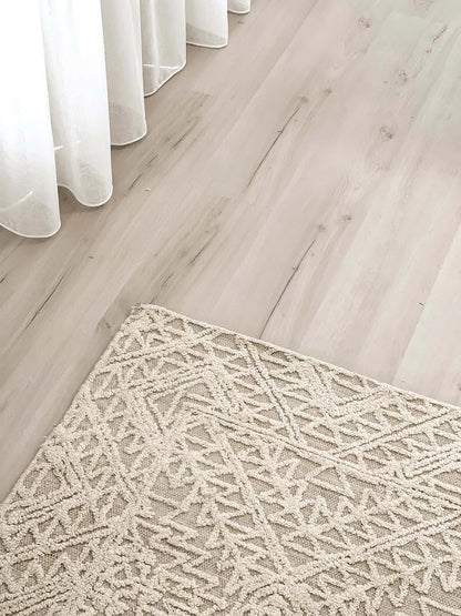 Eshana Ivory and Beige Modern Contemporary Handtufted Wool Rug